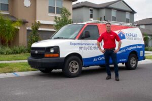Expert Home Service HVAC technician performing AC installation in Land O Lakes, FL