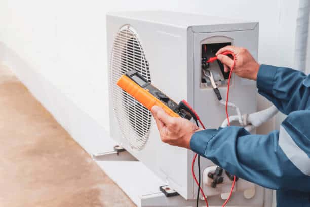 Professional HVAC contractor performing residential system maintenance in Lake County FL<br />

