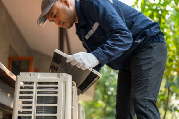 Certified HVAC specialist maintaining residential air conditioning in Hillsborough County FL