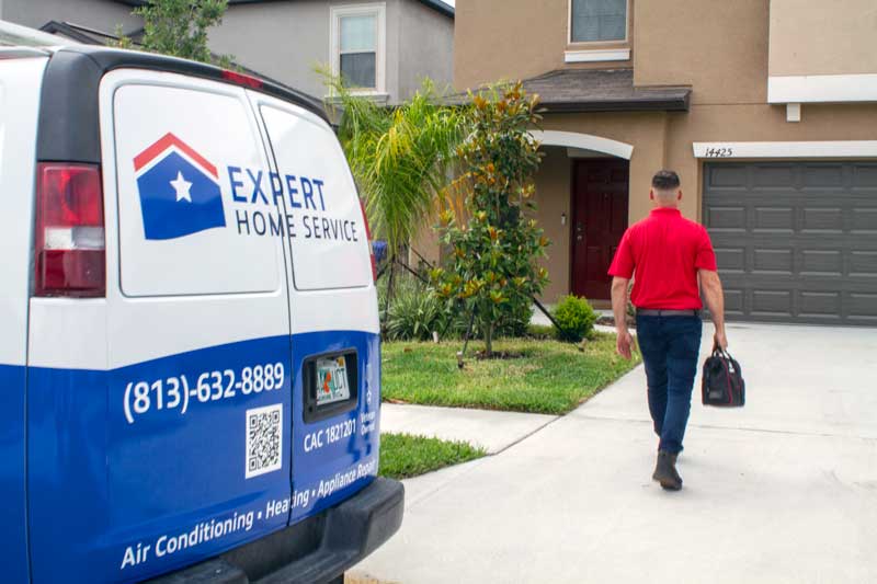 Expert Home Service branded truck and crew in Hyde Park