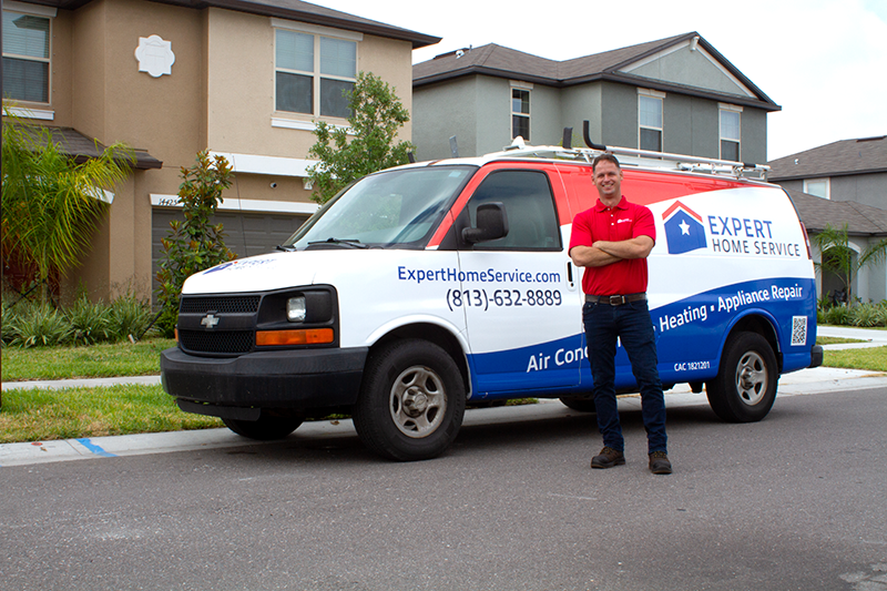 Expert Home Service branded truck and crew in Westchase