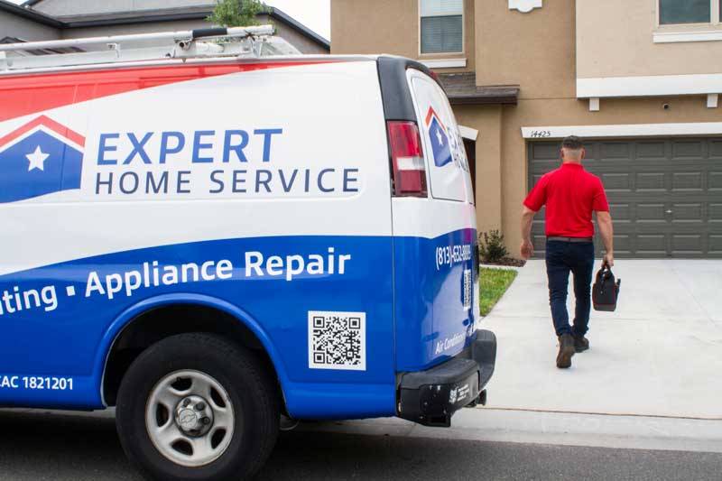 Expert Home Service branded truck and crew in Hyde Park